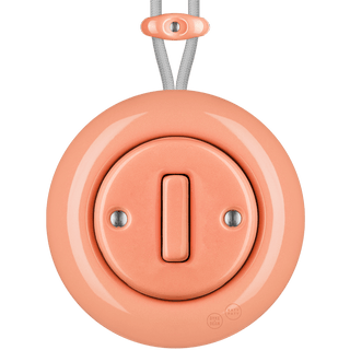 PORCELAIN KATY PATY COLONA ROUND SURFACE MOUNTED SLIM BUTTON SWITCH SALMON PINK - DYKE & DEAN