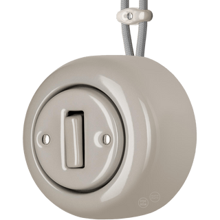 PORCELAIN ROUND SURFACE MOUNTED SLIM BUTTON SWITCH CAPPUCCINO - DYKE & DEAN